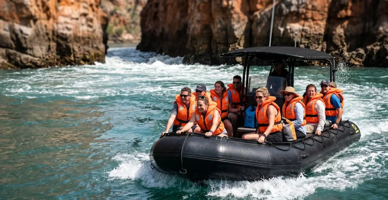 Expedition Zodiac boat navigating through powerful tidal currents at the narrow gorge entrance of Horizontal Falls in Western Australia